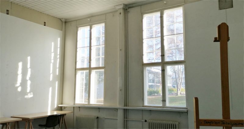A room with windows and a table