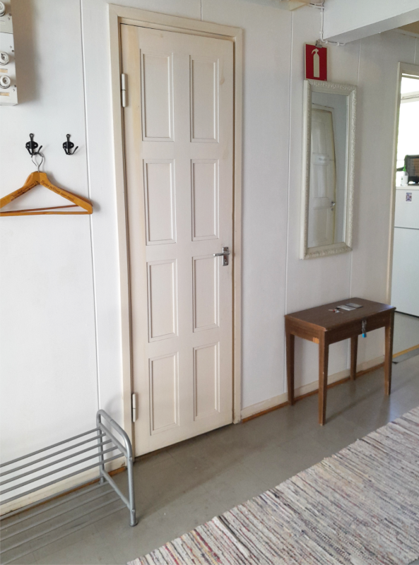 A door and a table in a room